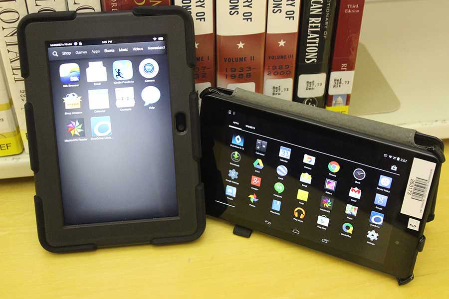 A+Kindle+Fire+and+Nexus+7+Tablet+are+opened+to+the+apps+pages+that+contain+many+features.+Students+can+use+the+tablets+to+read+and+use+online+textbooks+to+do+homework.