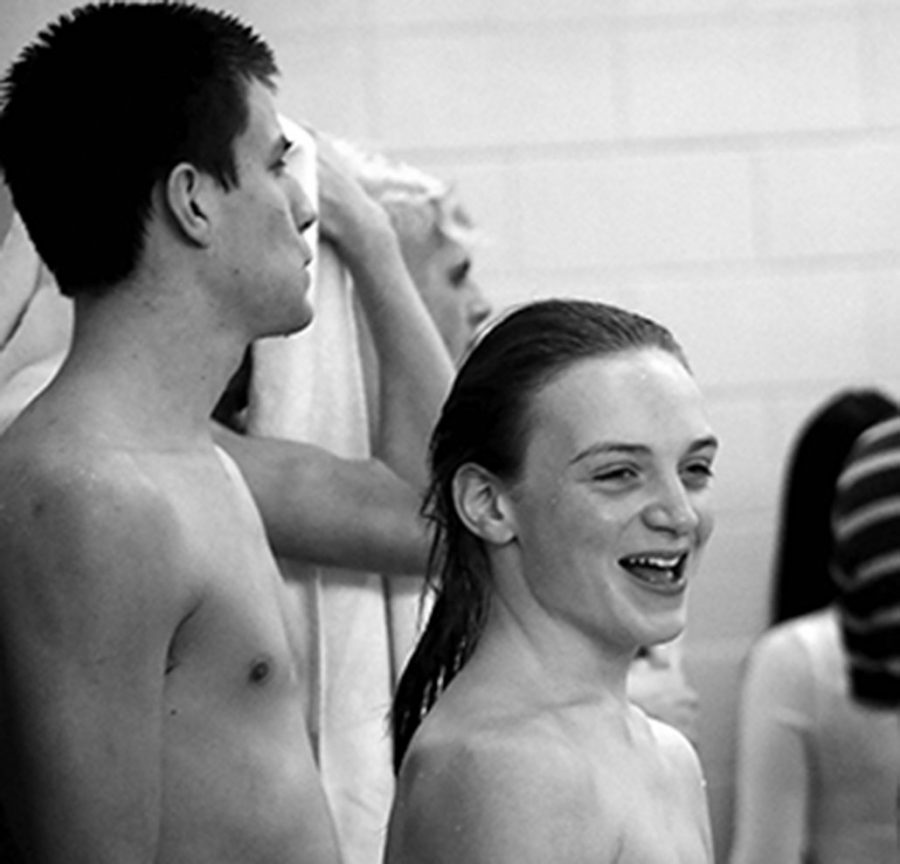 AJ Smith waits expectantly for his next event. He boasts a wide grin on his face while everyone else remains very serious and focused, for he has nothing to worry about. This is only Smiths sixth meet and he is already a district qualifier. Photo Courtesy of Don Borin, www.kingco athletics.com
