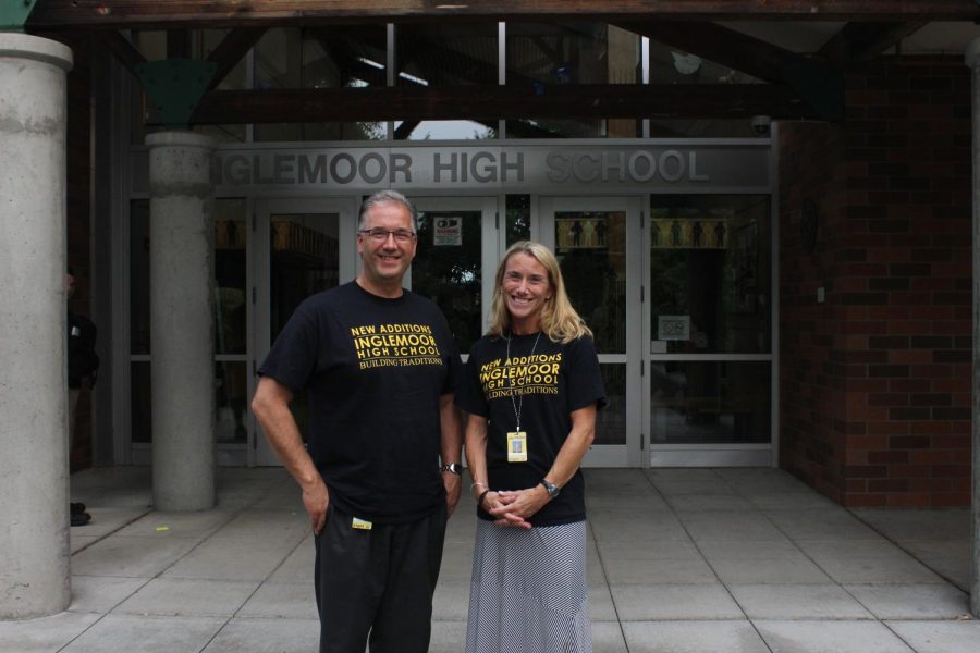 Assistant principals Joe Mismas and Erica Hill greet students with a smile outside the front doors. Both Mismas and Hill say they have a passion for helping students succeed. 