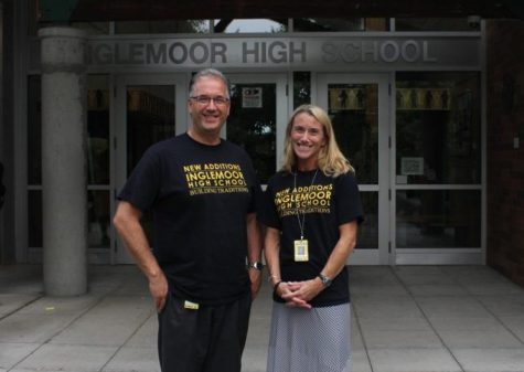 Assistant principals Joe Mismas and Erica Hill greet students with a smile outside the front doors. Both Mismas and Hill say they have a passion for helping students succeed. 