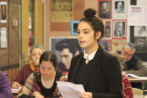 Prosecuting attorney Jaeden Burdge cross-examines a witness as jurors Vanessa Pilat and Natalie Brown look on. During the trial, Burdge and the other prosecuting attorney for the class split the workload with Burdge taking on cross-examination and the closing statement while her partner shouldered the opening statement and direct examination.