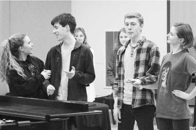 Actors practice for the musical. 