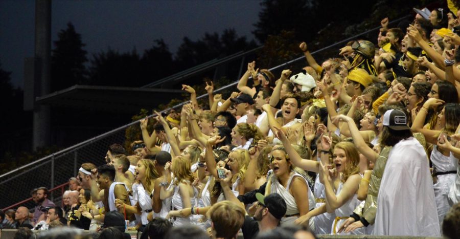 The Inglemoor student section celebrates the homecoming victory, as the Vikings slip past North Creek 21-12 at Pop Keeney stadium. 