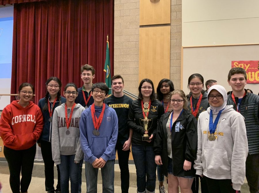 The Valhalla Team pose with their trophy after the award ceremony. Only the top three teams receive trophies. From left to right: senior Gloria Shi, junior Melissa Mitchell, freshman Harshini Iyer, freshman Ryan Nelson, junior Christopher Lee, senior Tom Mikolyuk, junior Karen Haining, sophomore Ashi Jain, senior Anna Weaver, senior Sandy Cheng, sophomore Nandira Mahmud and junior Conor Bartol. Not pictured: Kevin Shi. 