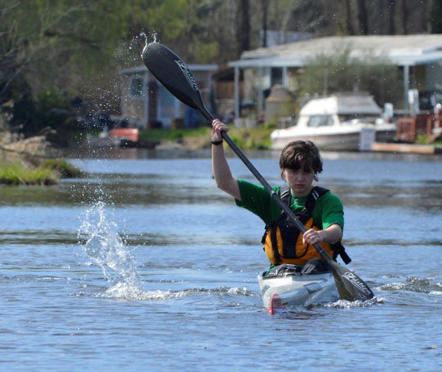 Jupiter Grant focuses on his paddling. He often practices kayaking in the Sammamish River near Bothell Landing Park.