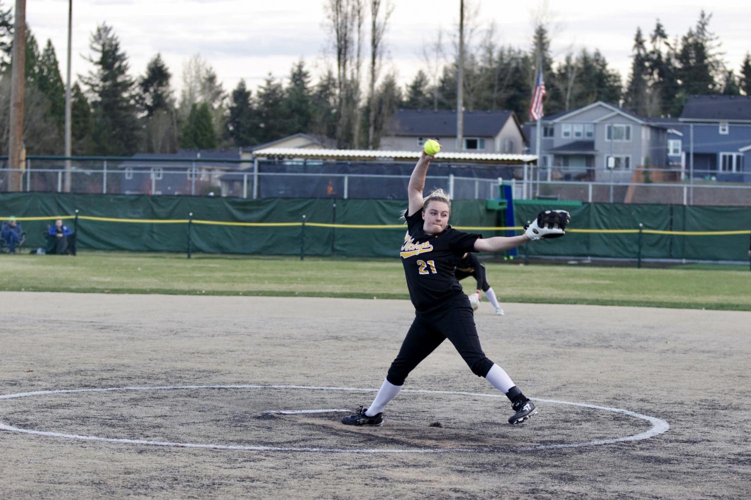 Pitcher+Taylor+Waara+fires+a+pitch+across+the+plate+against+the+Woodinville+Falcons.+The+girls+lost+a+low+scoring+game%2C+falling+to+the+Falcons+2-1+on+April+1st.+