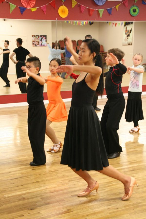 Anzu Yonezawa rehearses at her tri-weekly ballroom dance lesson at the Aria Ballroom. Although she is currently just a beginner, Yonezawa said that she is taking private lessons right now and hopes to level up to bronze soon.