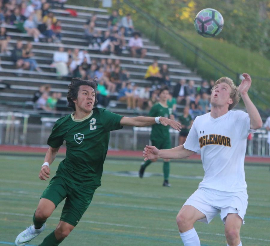 Senior Gabe Fahling heads the ball during the Vikings match versus Redmond High on May 7, they would go on to win 1-0.