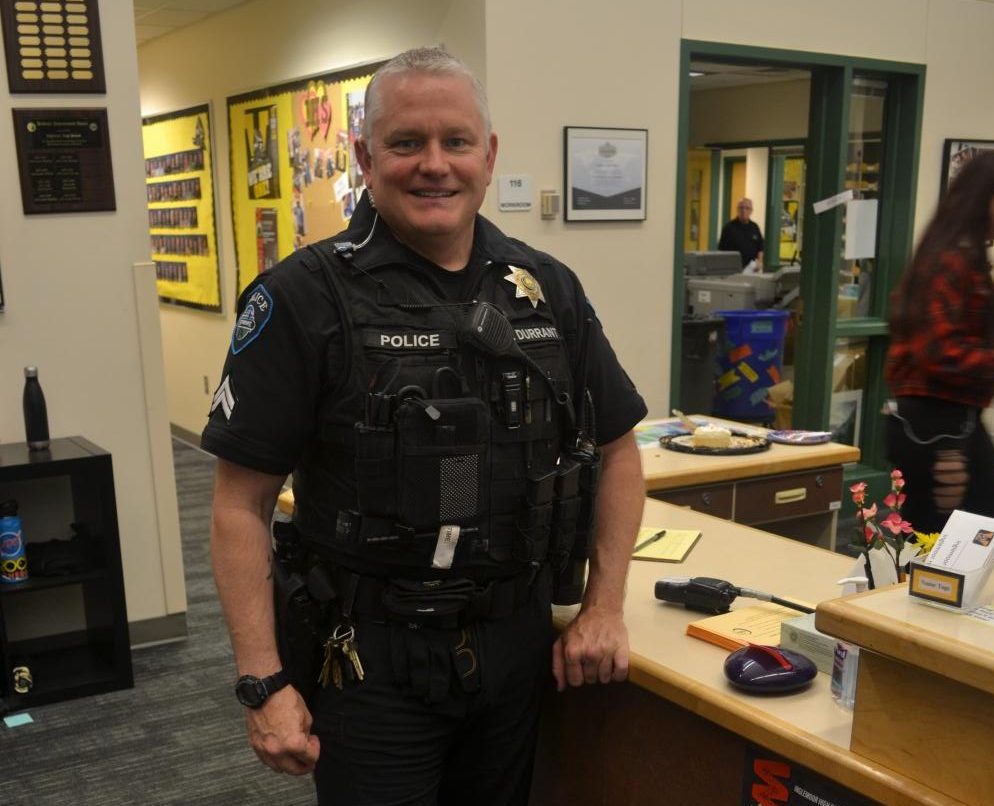 School+Resource+Officer+Jeffrey+Durrant+stops+by+the+main+office+while+patrolling+campus+during+lunch.