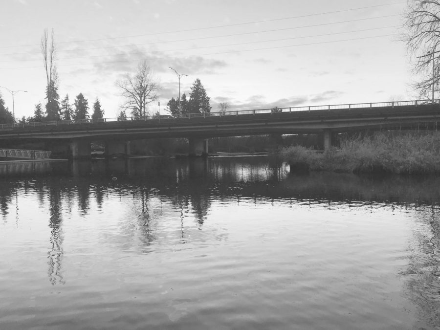 Cars cross the West Sammamish River Bridge at sunset on Feb. 3, 2020. The bridge is set to be demolished during the second phase of the project in 2021. Photo by Sonya Sheptunov