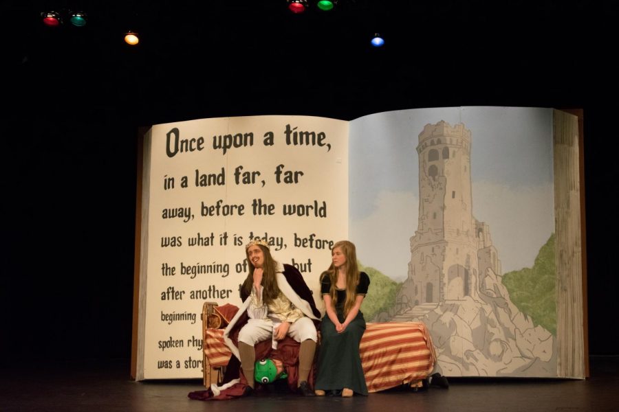 Seniors Ya’am Zahavy Mittelman and Owain Waszak and sophomore Gabi Kotwicki (left to right) play the King, the Frog Prince and
the Princess respectively. The King gives his daughter romantic advice while the Frog Prince hides underneath the bed on Jan. 25.
Photo by Cathy Zhao