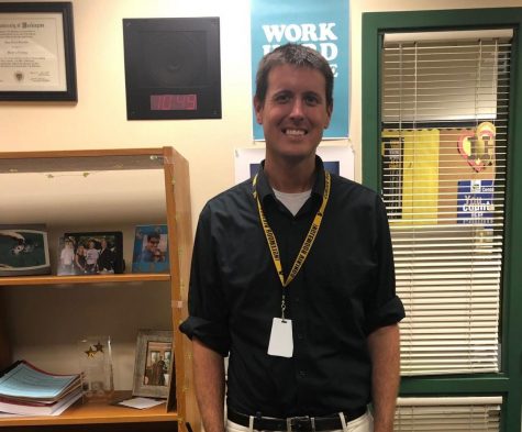 Principal Adam Desautels stands in his office at Inglemoor High School on Feb. 26. Photo by Ishika Kaushik