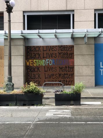 Graffiti lines the walls of Seattle, pledging silent support for the BLM movement. Photo by Rahima Baluch
