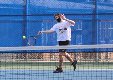 Senior and first singles player Adam Walter prepares for an underhand shot during his match against Bothell. Photo courtesy of Jim Orr. 
