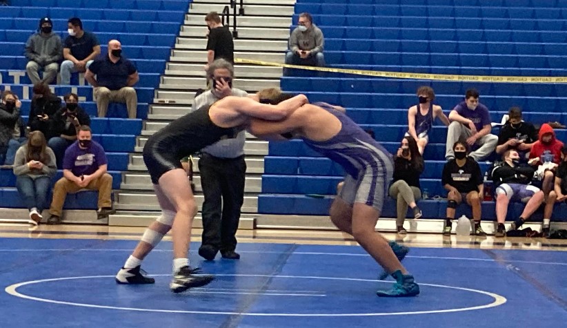 Senior Ian Geddes faces off against his opponent during a Double Duel against North Creek and Woodinville on April 27th. Photo courtesy of Caden Whitmire.