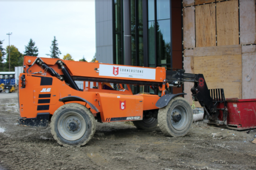 Construction is finishing up outside of the new Performance Center. The construction started in September 2020, and the contrast of the modern building to the current campus gives students some insight into what Inglemoor might look like in the future. 