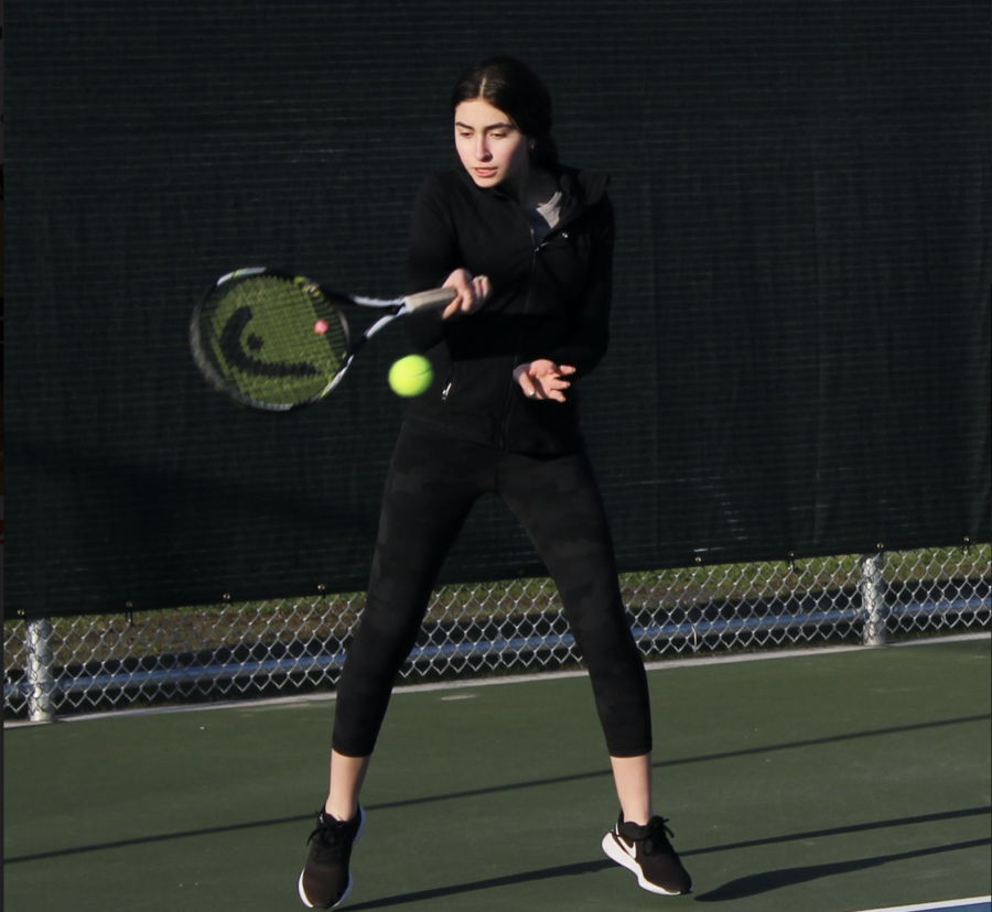 reshman Megan Liao practices a forehand on March 1. 
