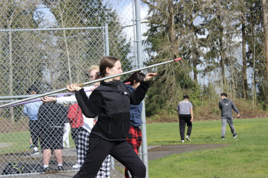 
Freshman JayJay Maclean poses to throw a javelin at a practice on April 4.