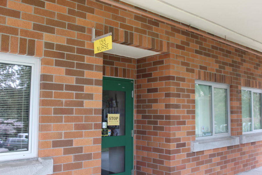 The Health Room is located in the front of campus, next to the Career Center. A sign posted to the door reads “STOP. Health Room pass is required.”