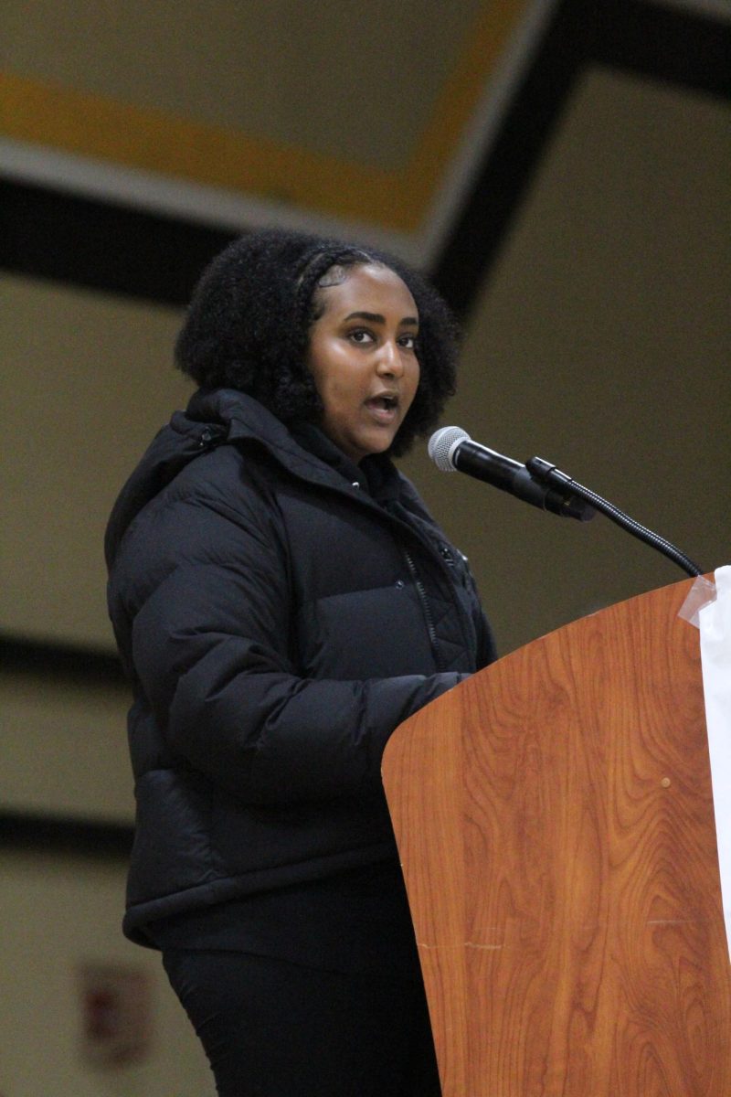 Black Student Union President Lillie Tsegay shares her experiences with microaggressions at school at the Martin Luther King Jr. assembly on Jan. 11