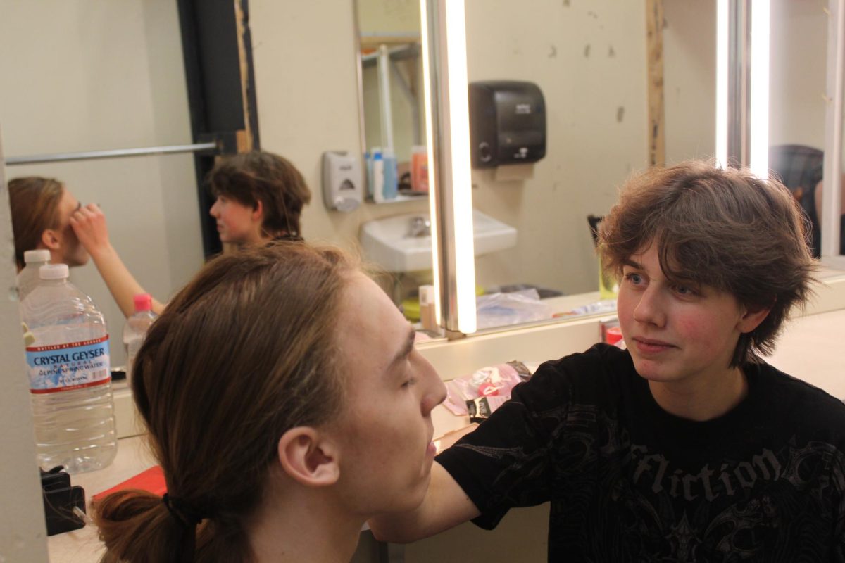 Biestek does a basic theater makeup look for senior Jackson Lee-Gill, similar to the makeup styles in “The Play That Goes Wrong.” It usually takes Biestek around 45 minutes to do one theater makeup look.