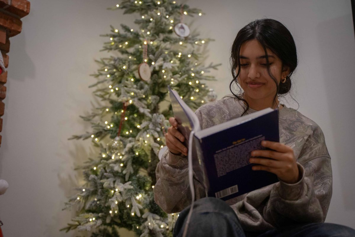 Shameem reads the Qur’an. She celebrates Christmas as a Norwegian custom, despite being Muslim. 