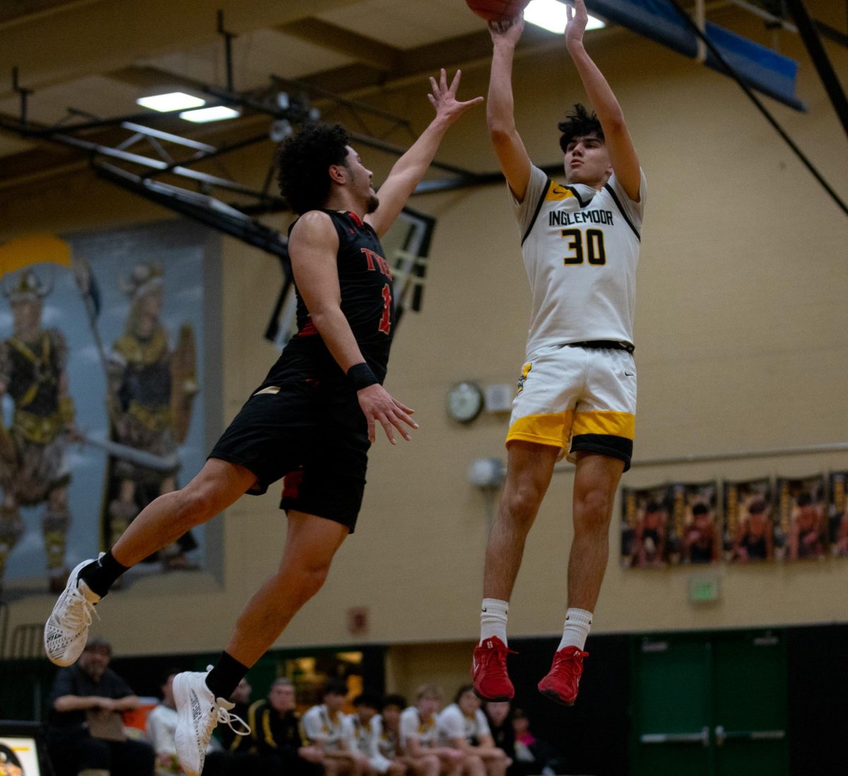 Senior guard Aman Sterling pulls up from midrange during the first quarter of a game against Tyee. The Vikings won 83-45, moving their record to 8-6. "I've grown more confident over the years, especially in my shooting abilities," Sterling said