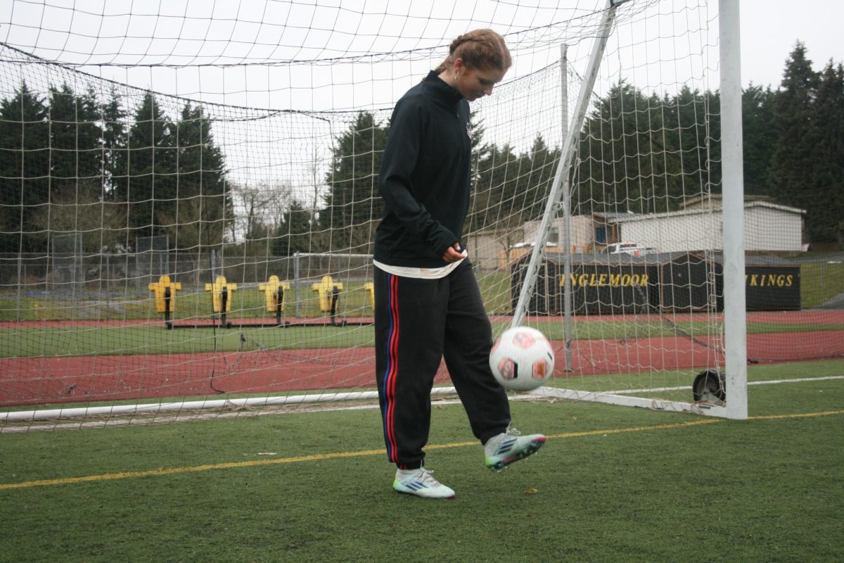 Budden juggles a soccer ball. Soccer players use juggles to improve focus, ball control and foot-eye coordination.