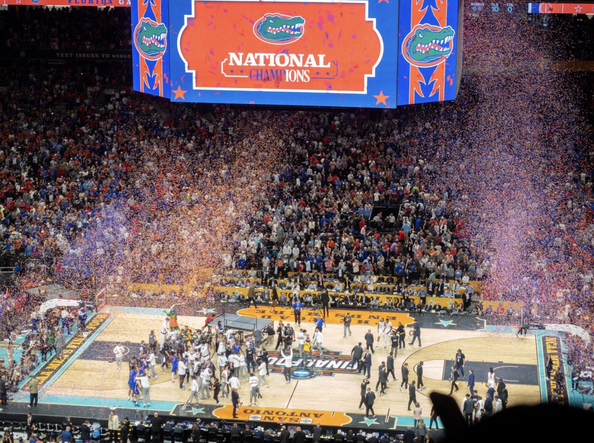 Confetti rains down from the ceiling for the Gators after Florida wins their third National Championship.
