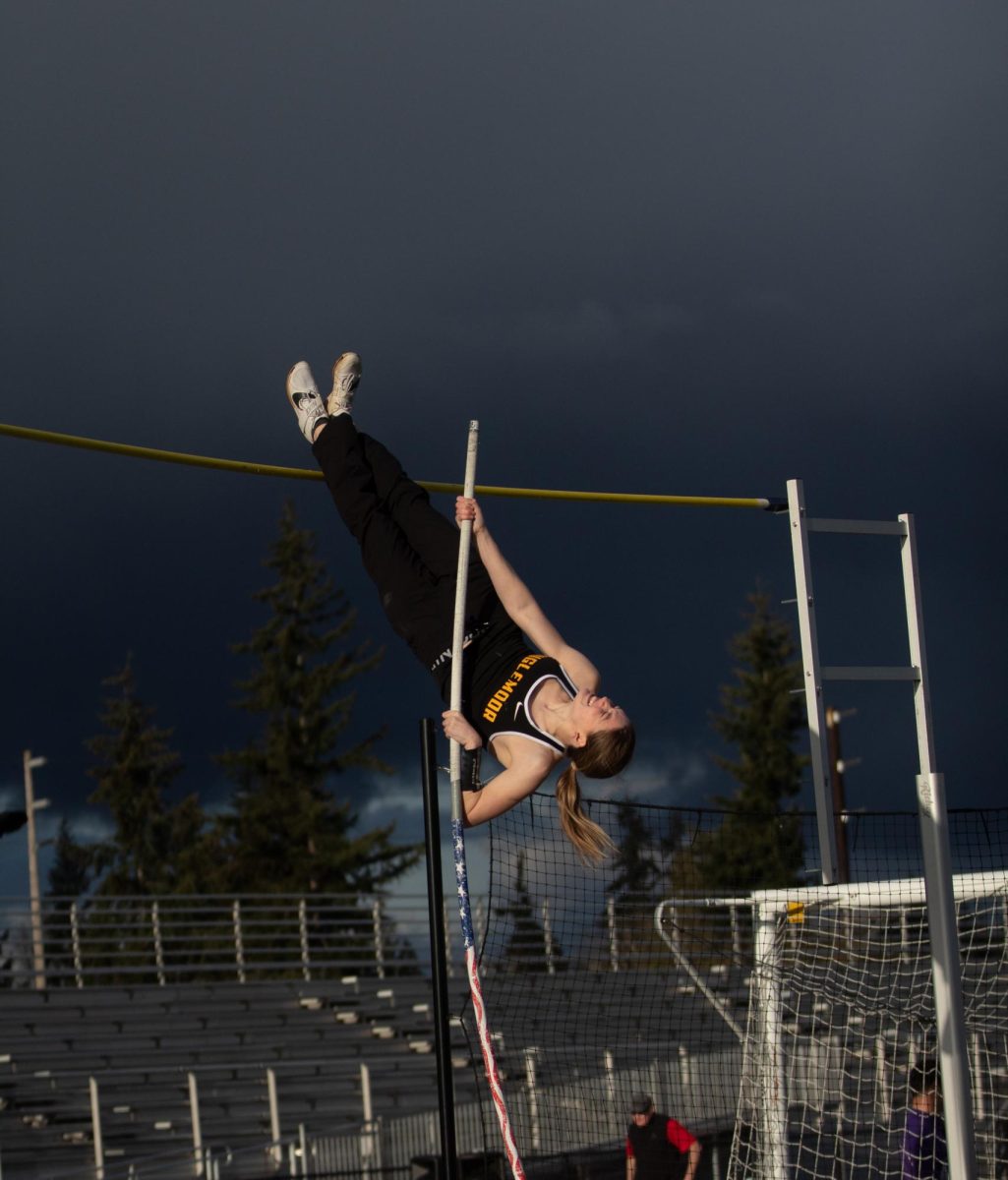Jones vaults into the air at Lake Washington High School during
a meet.