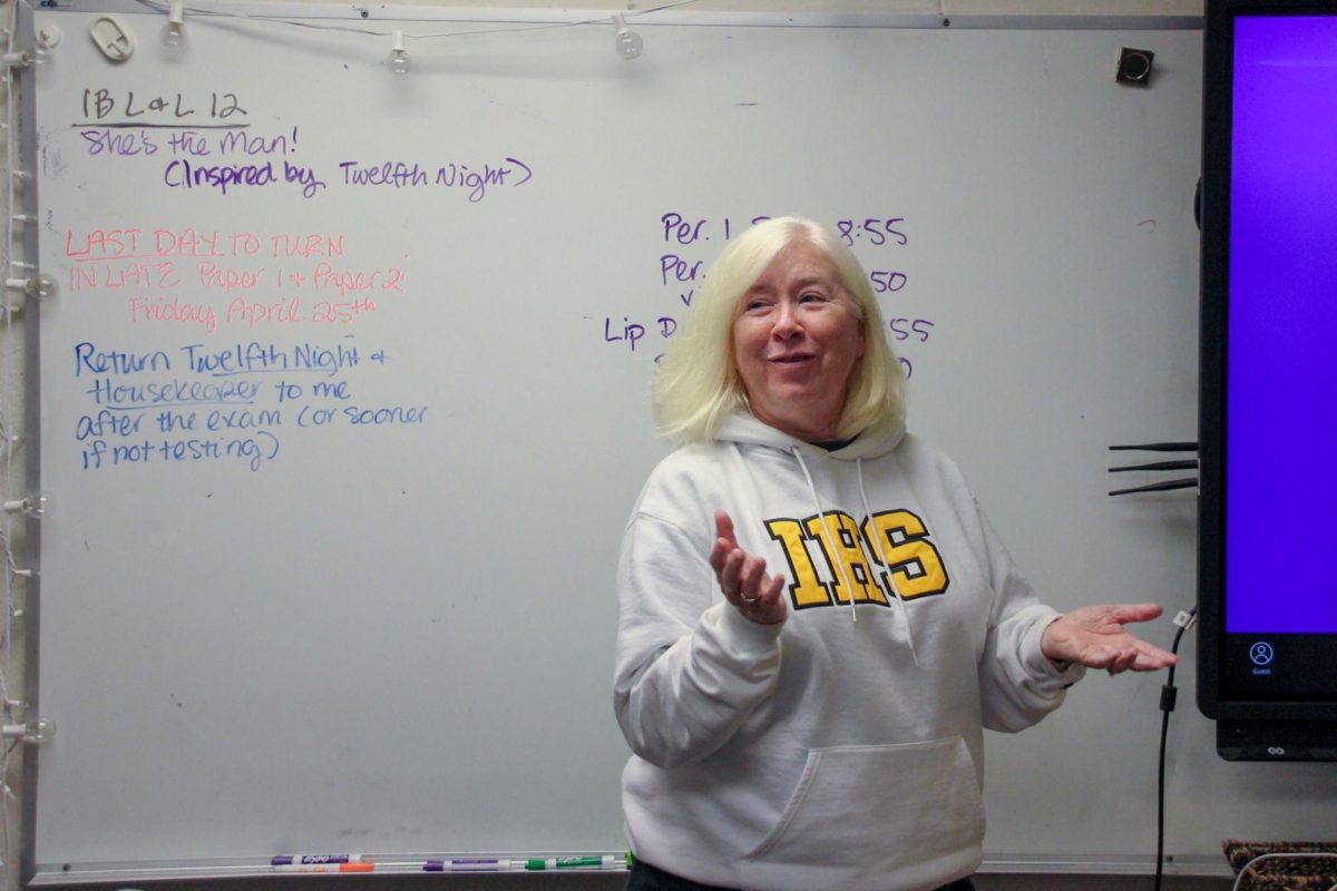 Lund prepares to welcome students before first period. “My favorite part about teaching is the students, and how I get to stay caught up with what’s going on in teen culture and all of that,” Lund said.