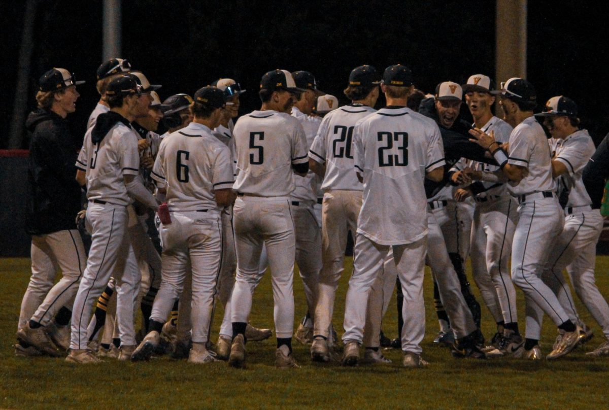 The boys varsity baseball team celebrates their victory over Sammamish High School, the first game of the playoffs and game one of a
double-header. In the single elimination tournament, every game could have been their last.
