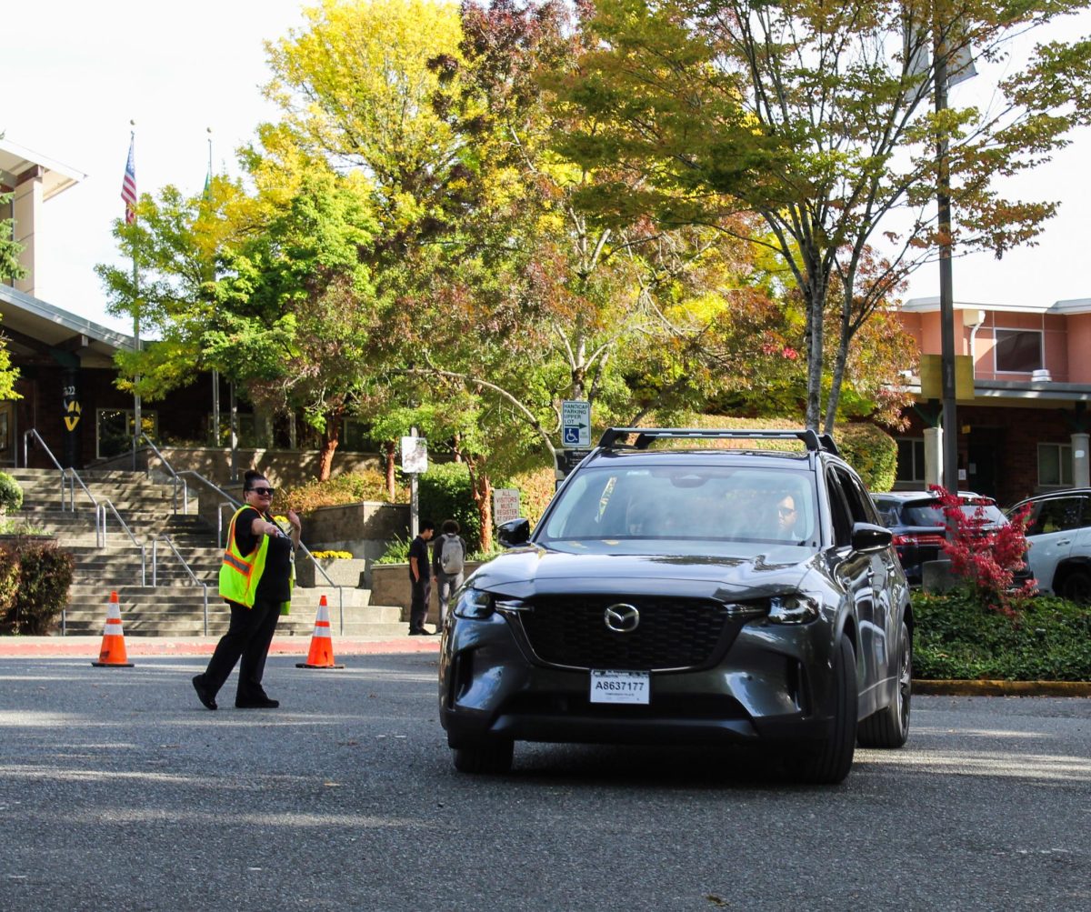 Beeson directs end-of-day traffic at the front of the school. “We have two people dedicated every day to get people in and out of here. We came up with a new system where we open up the different roads so that people can exit out the back,” Beeson said.