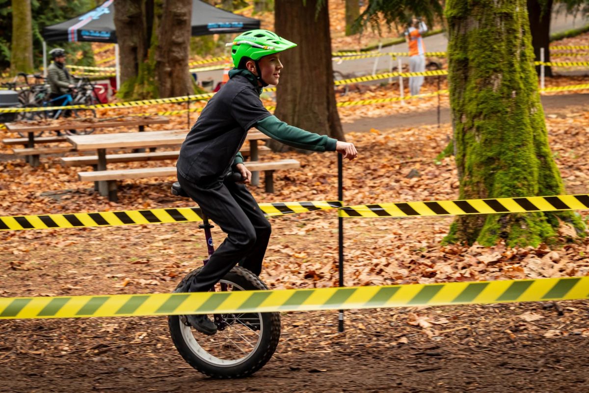 Bucher rides his unicycle along the marked trail in the 2023 Woodland Park Cyclocross. He competed in and won first place in the unicycle category.
