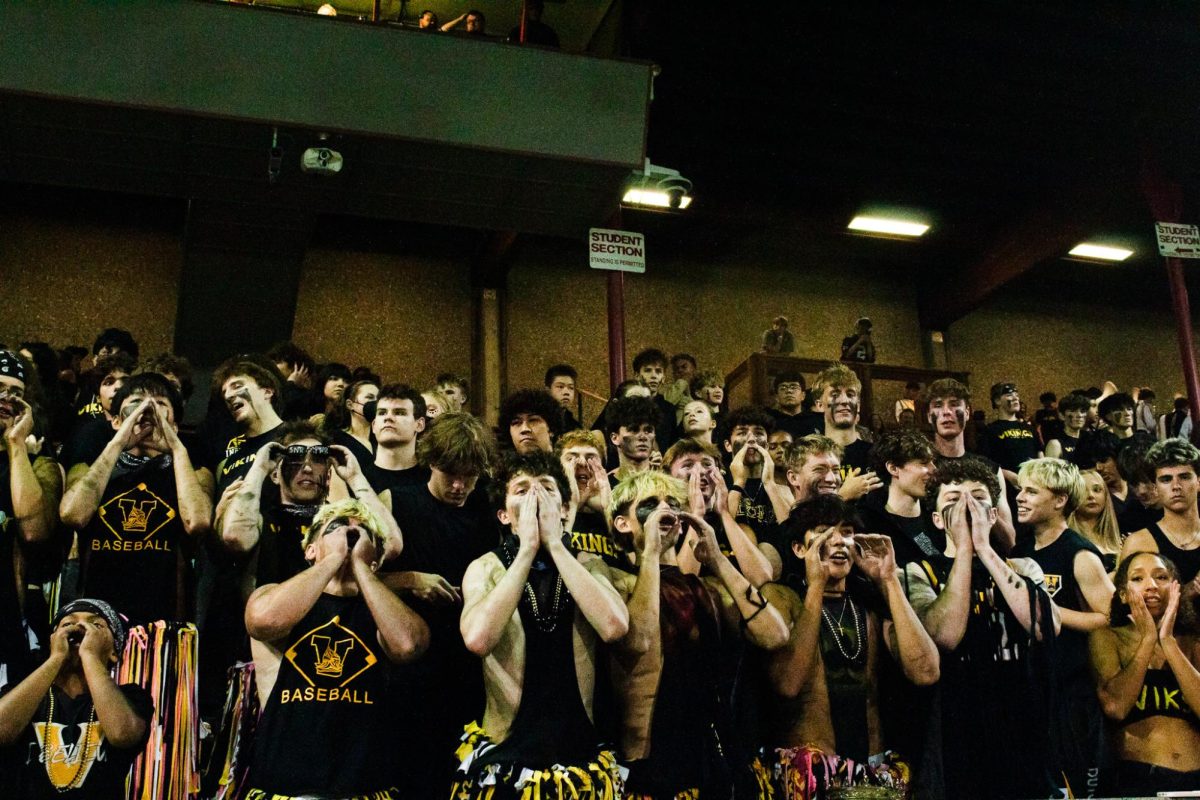 Viking student sections cheers along with the Inglemoor cheerleading team at the Sept. 27 game vs. Redmond.