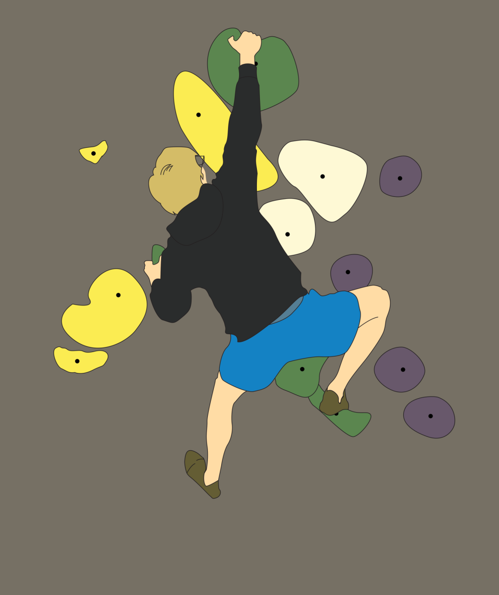 An athlete scales a V6 climb. This is considered an intermediate to advanced grade in the bouldering system.